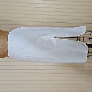 Olga lace trimmed half slip skirt in a satiny nylon w applique